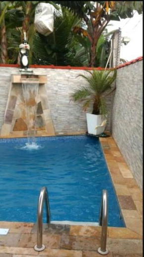 Casa com Piscina Aquecida e Ar Condicionado